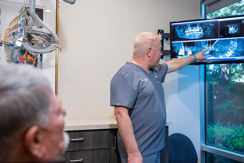 Doctor going over x-rays with Patient