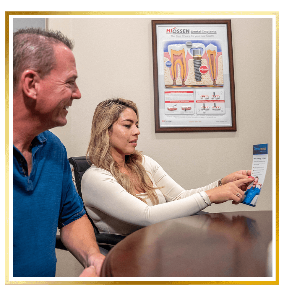 team member going over Insurance and financing option with patient