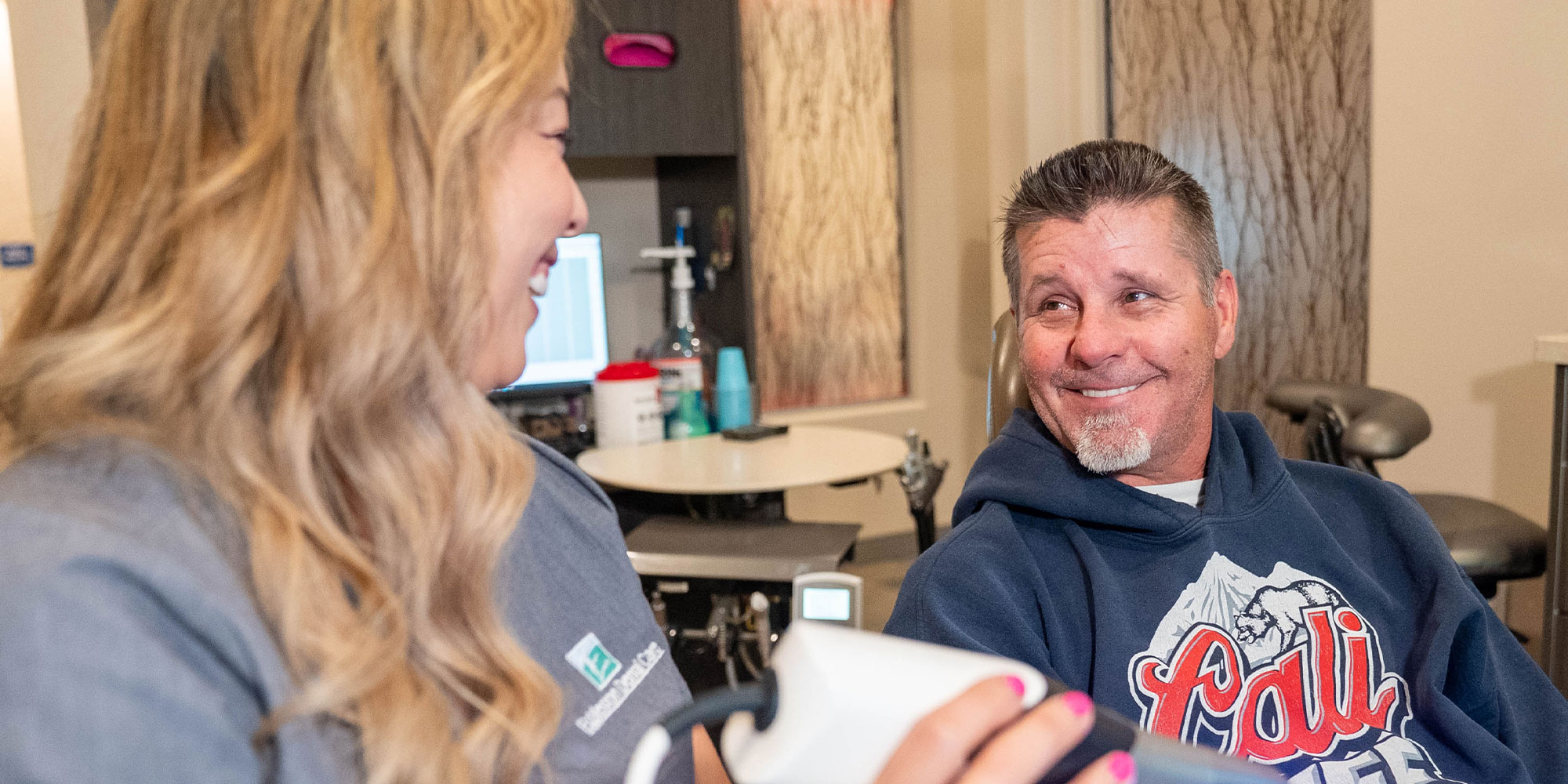 Team member getting ready to scan Patients Teeth