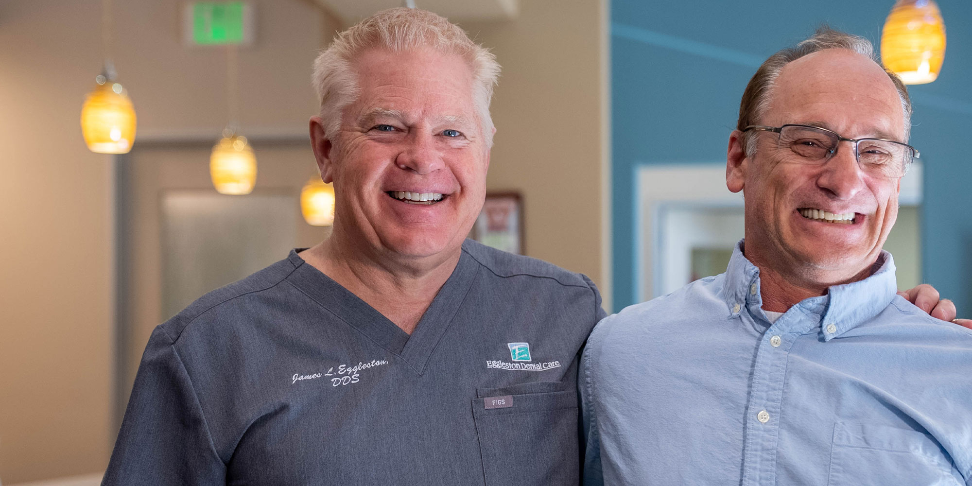 Dentist Smiling with Paitent